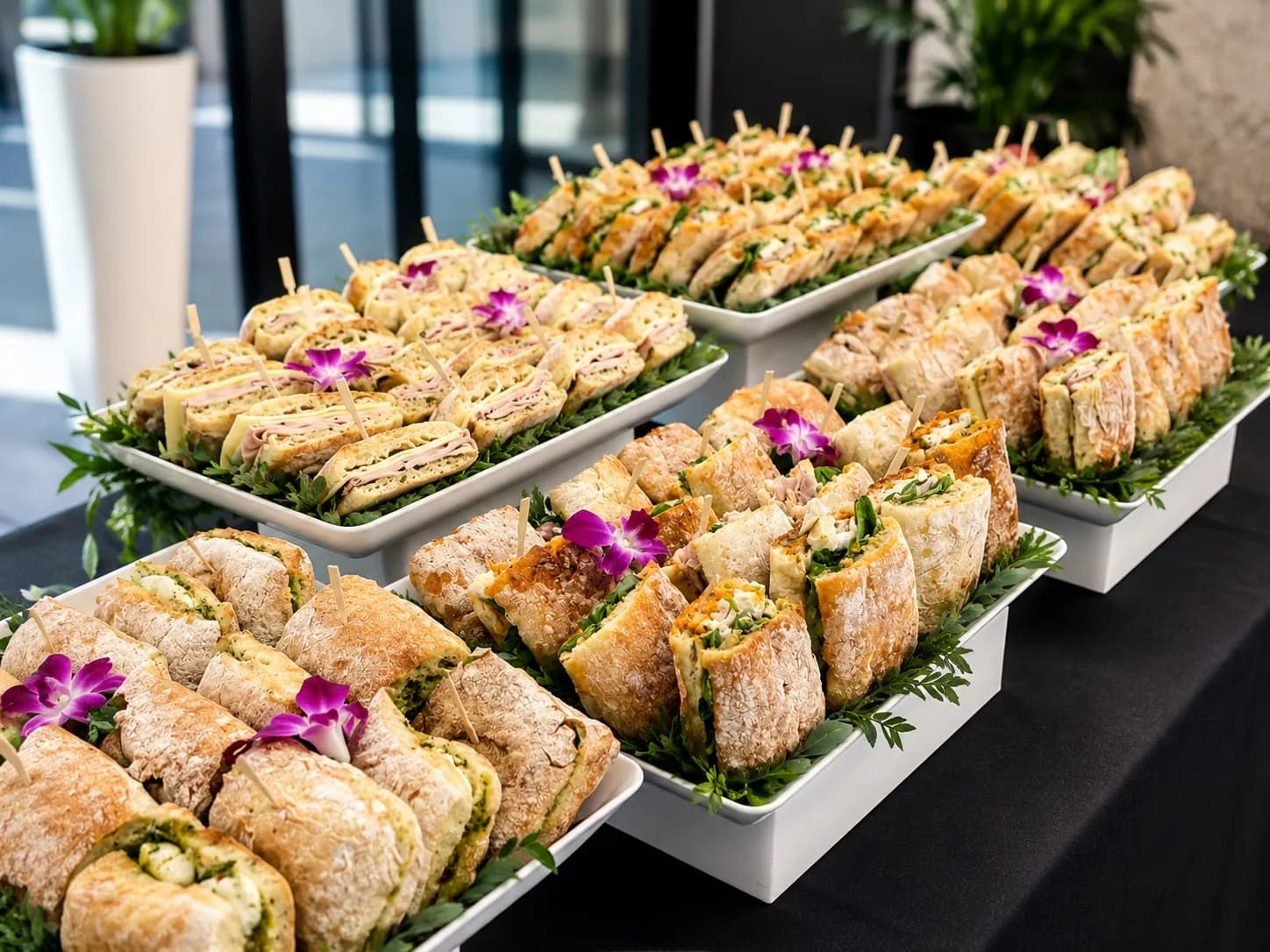 Corporate sandwich display with gourmet sandwiches by KMR Gourmet Catering Los Angeles
